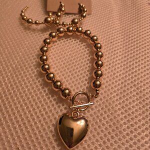 Single strand gold ball bracelet with heart charm and  gold ball hoops to match